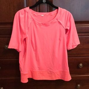 Coral Lululemon shirt, open on sides